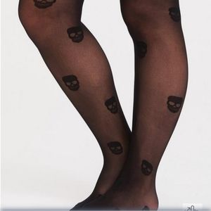 Torrid allover skull tight size 3/4